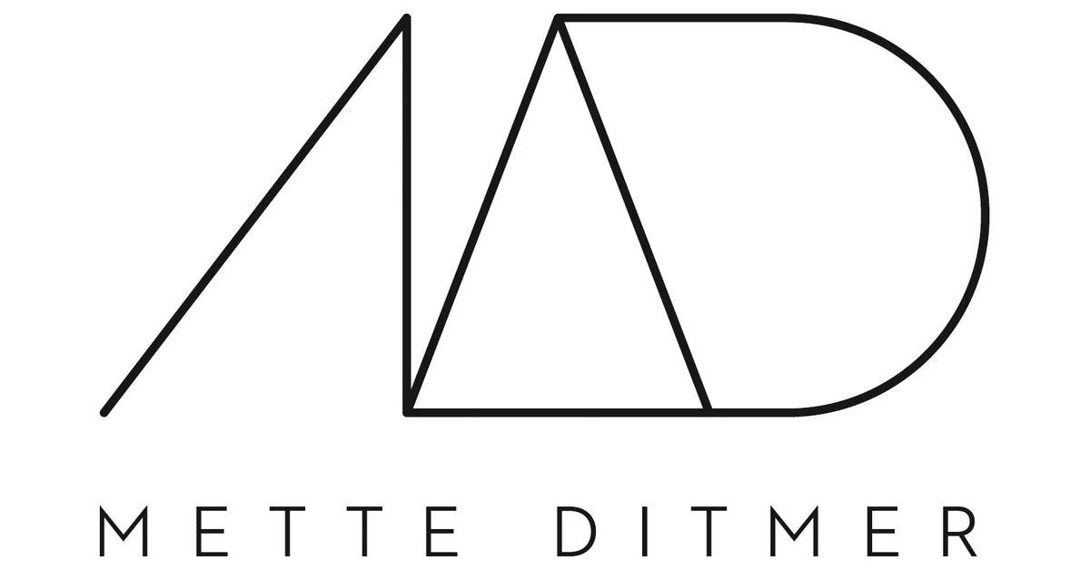 Mette Ditmer Logo in Schwarz – dänisches Designlabel für stilvolle Bad- und Wohnaccessoires