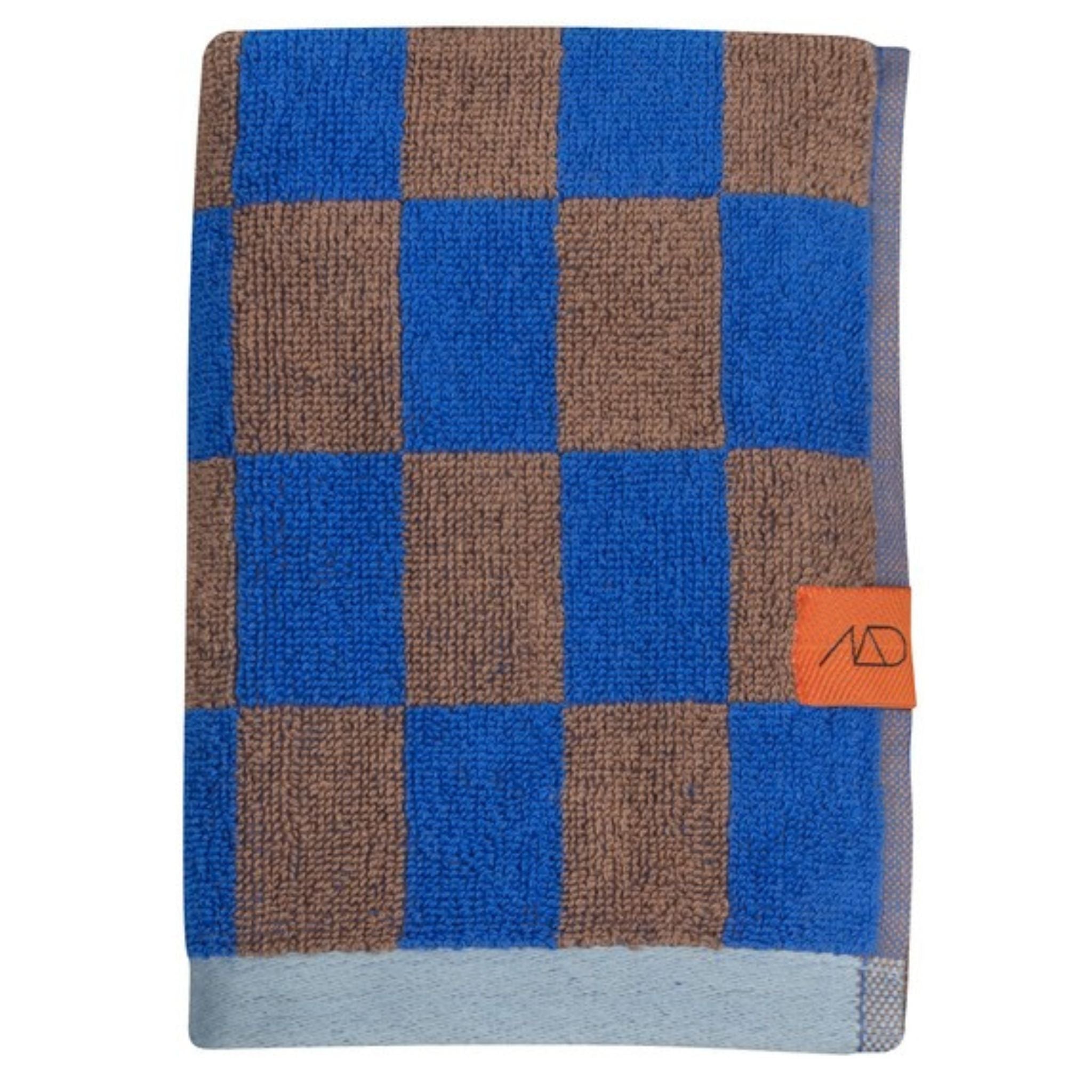 Kariertes Handtuch  dunkelbraun blau.