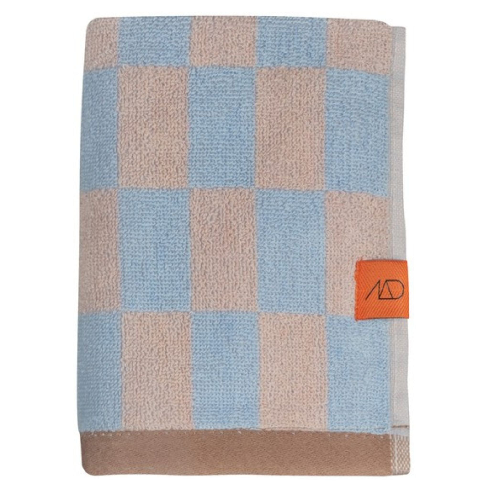 Kariertes Handtuch rosa hellblau.
