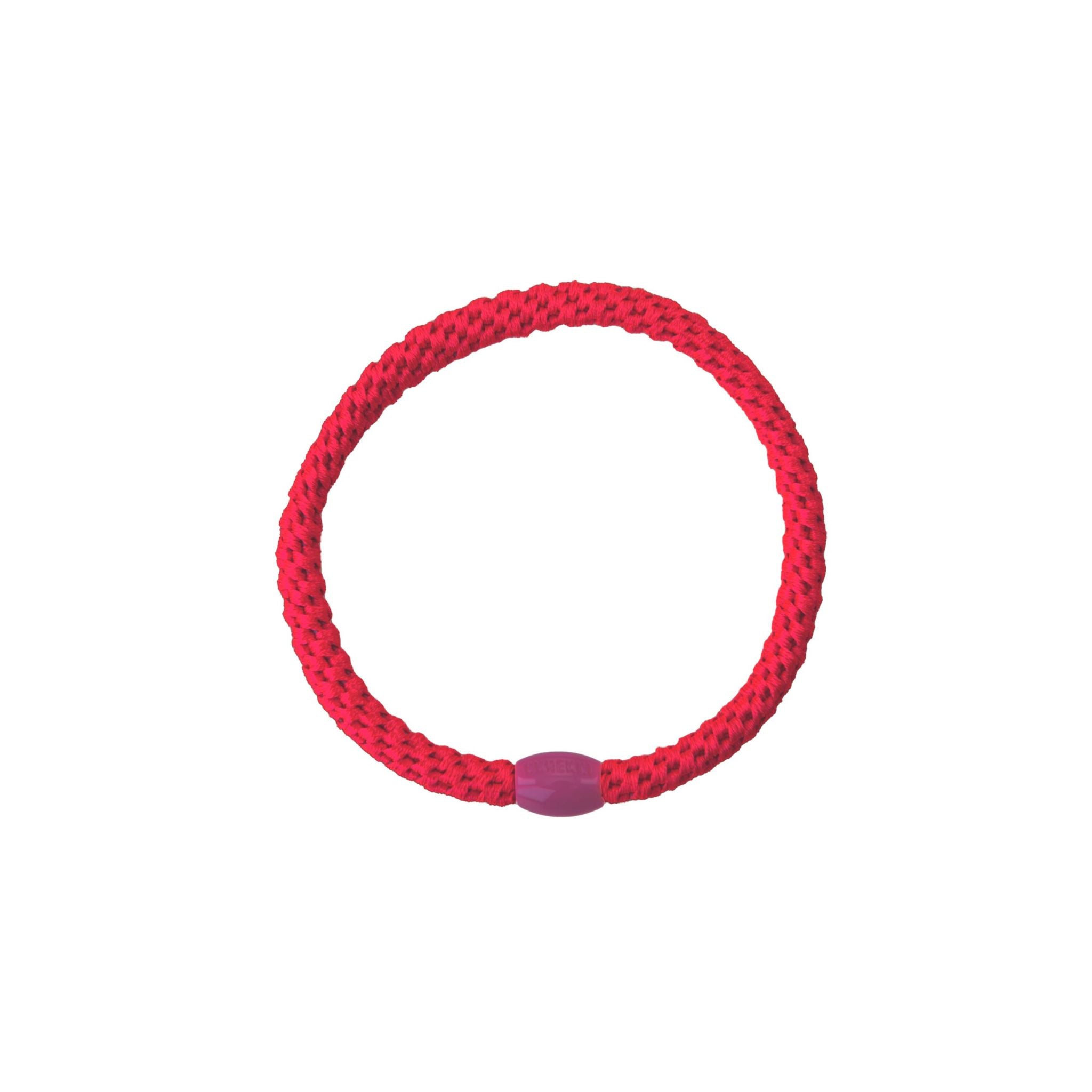 Neon-pinker Kknekki Slim Haargummi mit geflochtener Struktur.
